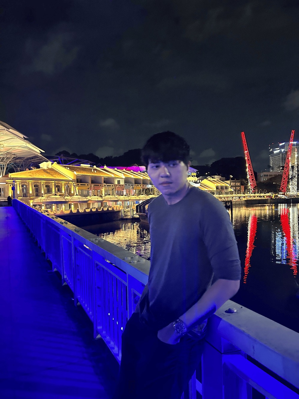 Clarke Quay’s vibrant nightlife with colorful buildings and riverside dining
