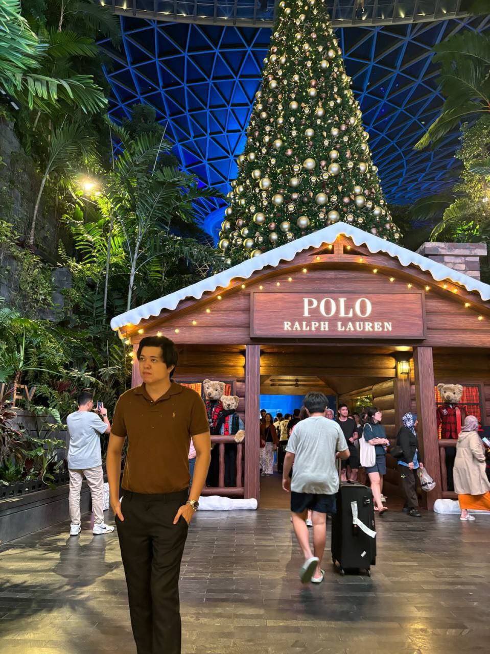Ralph Lauren 2024 Christmas decor at Jewel Singapore, with a towering Christmas tree and brand themed winter hut
