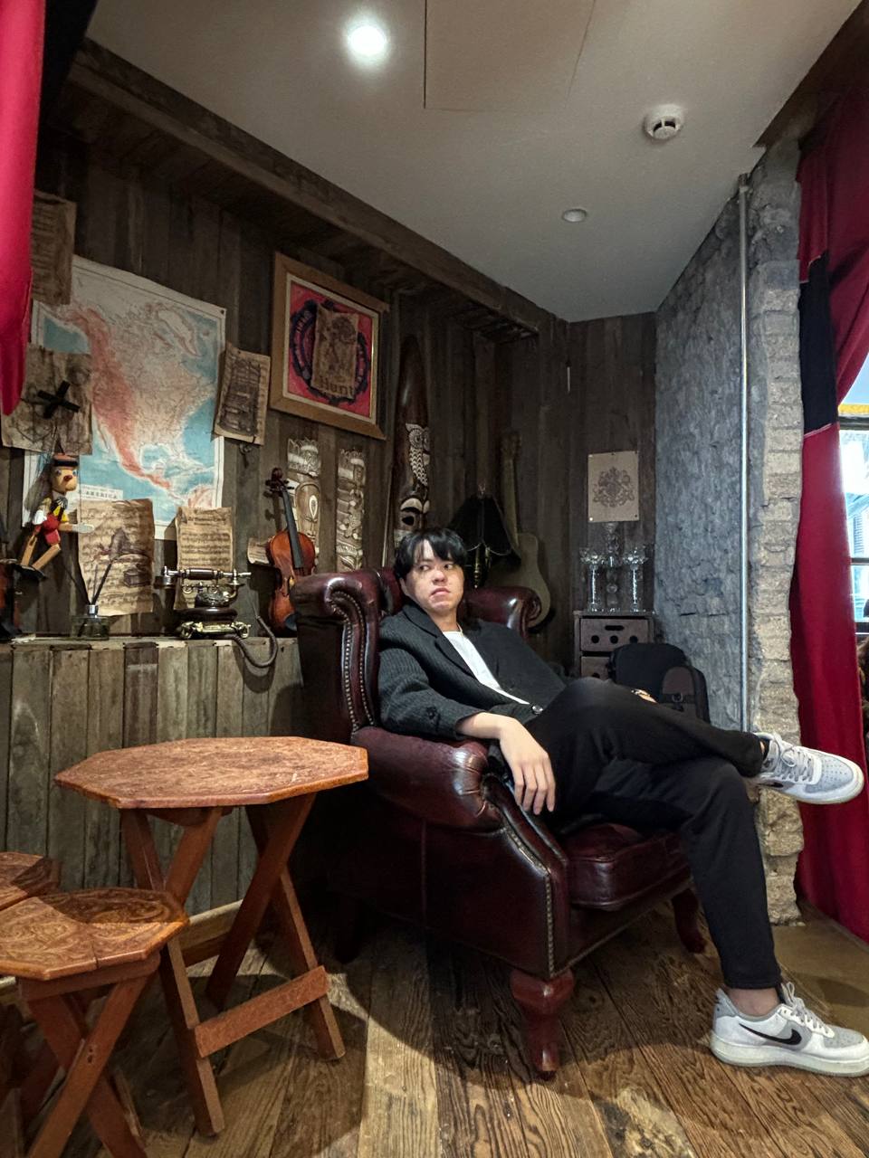 A cozy cafe in Korea with rustic decor and coffee selections
