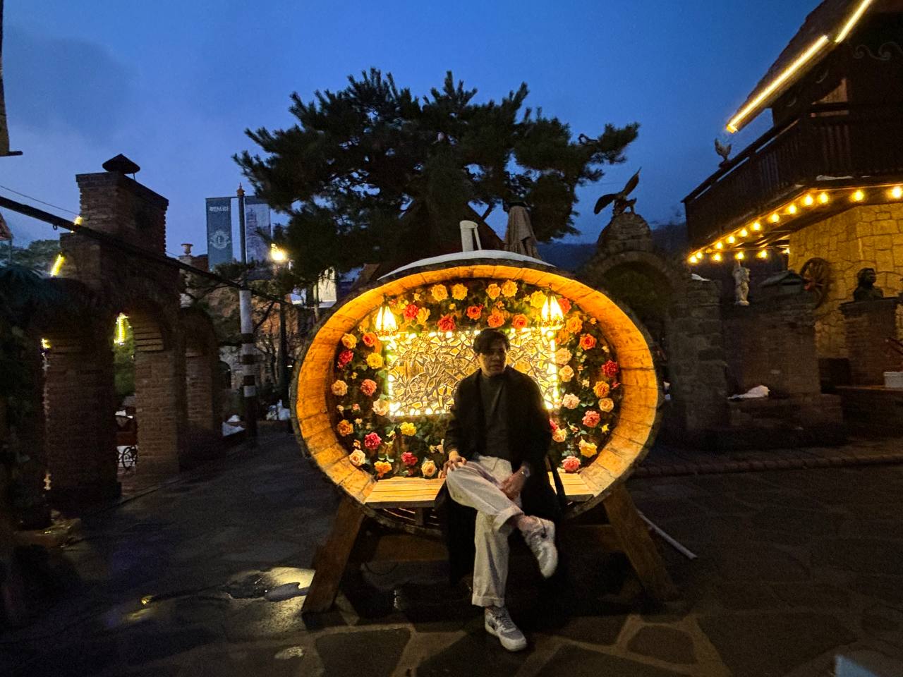 Ludensia, a vibrant city street with cafes and shops