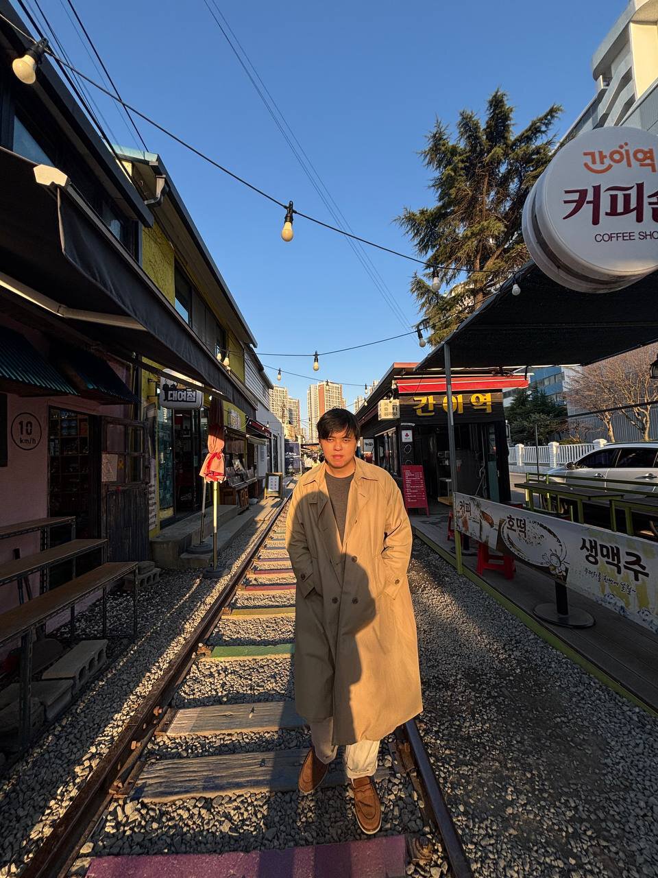 Railway street with train tracks through a market in Gunsan